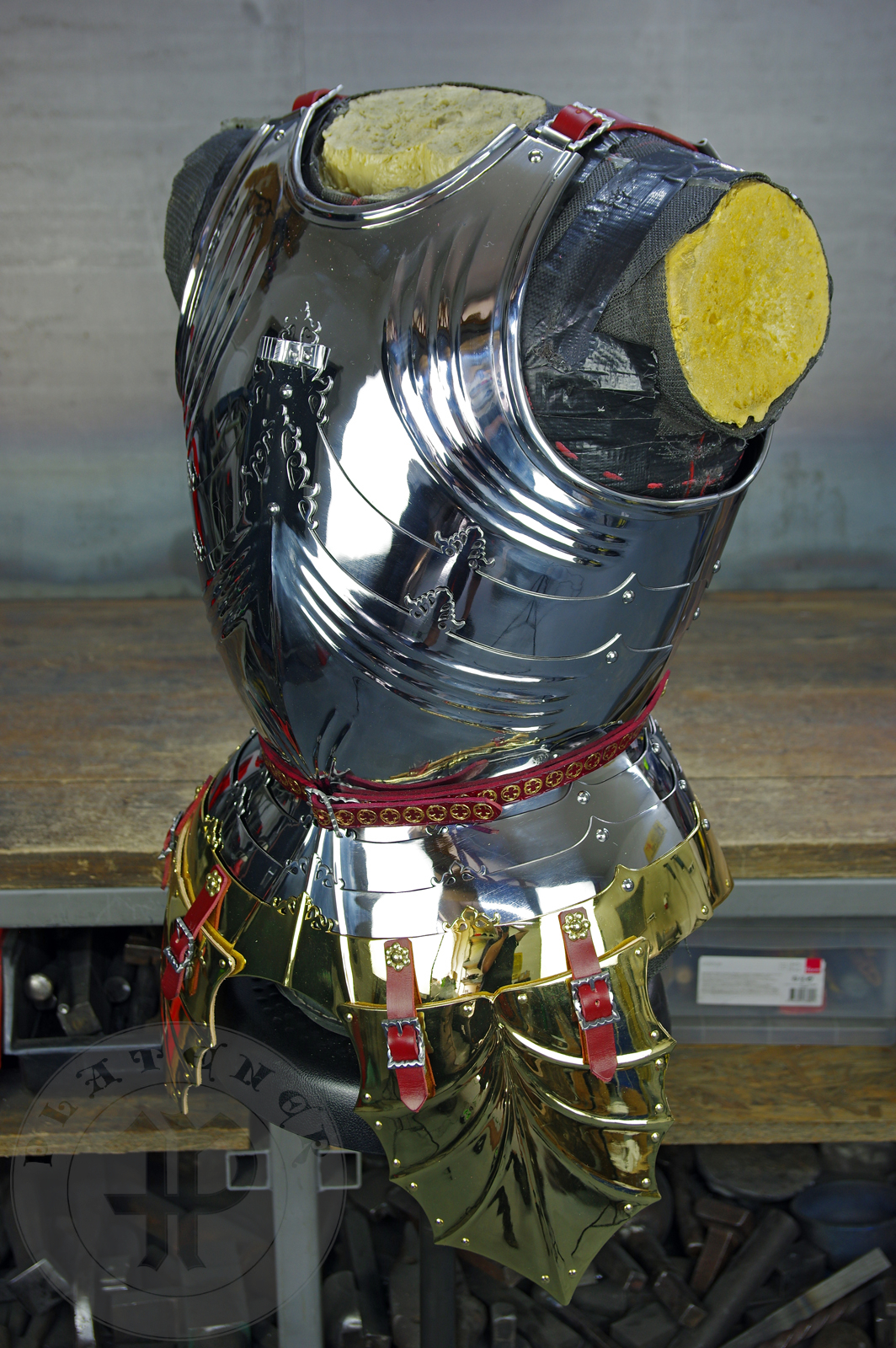 The high gothic set circa 1480-1485 in Helmschmied style consists of sallet, bevor and cuirass. They are made of steel in various thickness: 2 mm; 1,5 mm and 1,2 mm and heat hardened and tempered up to 42 HRC for cuirass with bevor and 38 HRC for sallet. The visor, lower lames and tassets are brass gilded. I also crafted handmade steel buckles for this set. Overall it involved around 850 of work hours to make it.