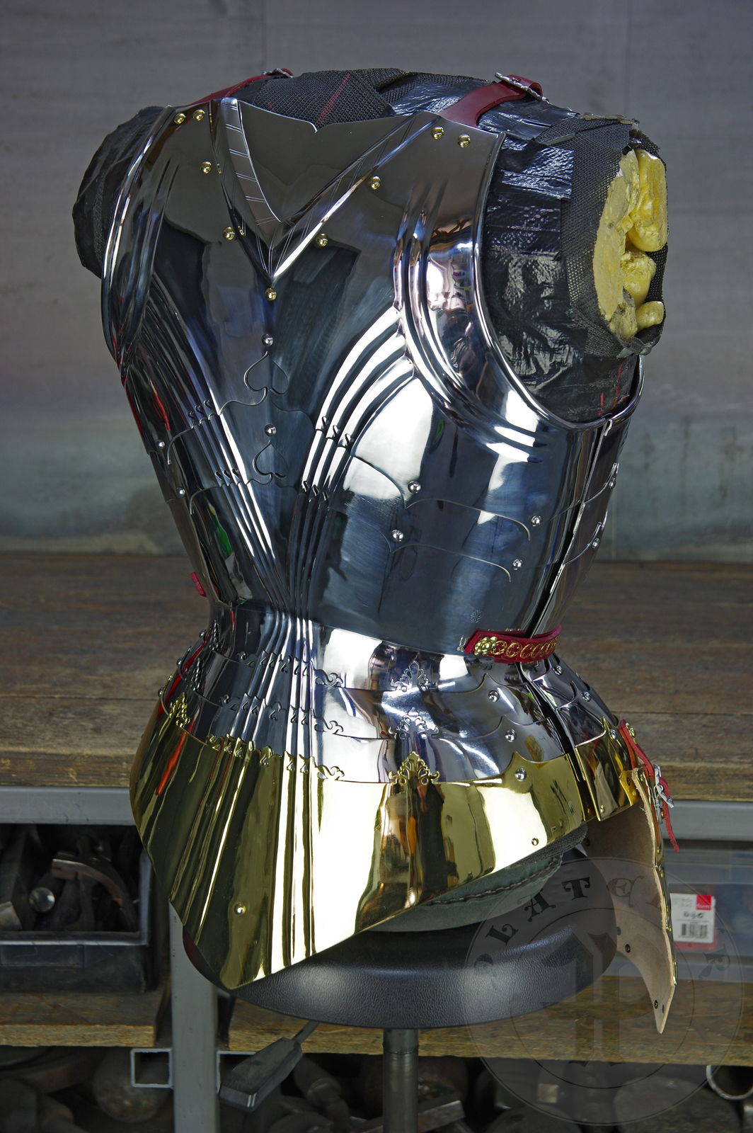 The high gothic set circa 1480-1485 in Helmschmied style consists of sallet, bevor and cuirass. They are made of steel in various thickness: 2 mm; 1,5 mm and 1,2 mm and heat hardened and tempered up to 42 HRC for cuirass with bevor and 38 HRC for sallet. The visor, lower lames and tassets are brass gilded. I also crafted handmade steel buckles for this set. Overall it involved around 850 of work hours to make it.