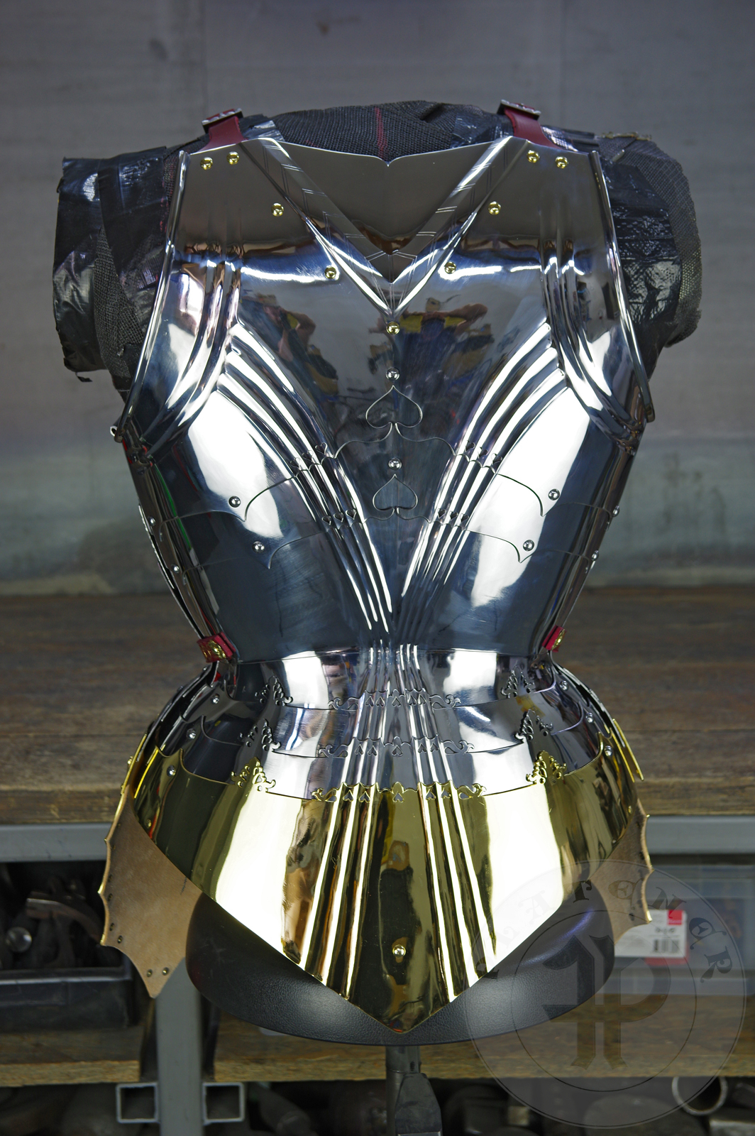 The high gothic set circa 1480-1485 in Helmschmied style consists of sallet, bevor and cuirass. They are made of steel in various thickness: 2 mm; 1,5 mm and 1,2 mm and heat hardened and tempered up to 42 HRC for cuirass with bevor and 38 HRC for sallet. The visor, lower lames and tassets are brass gilded. I also crafted handmade steel buckles for this set. Overall it involved around 850 of work hours to make it.