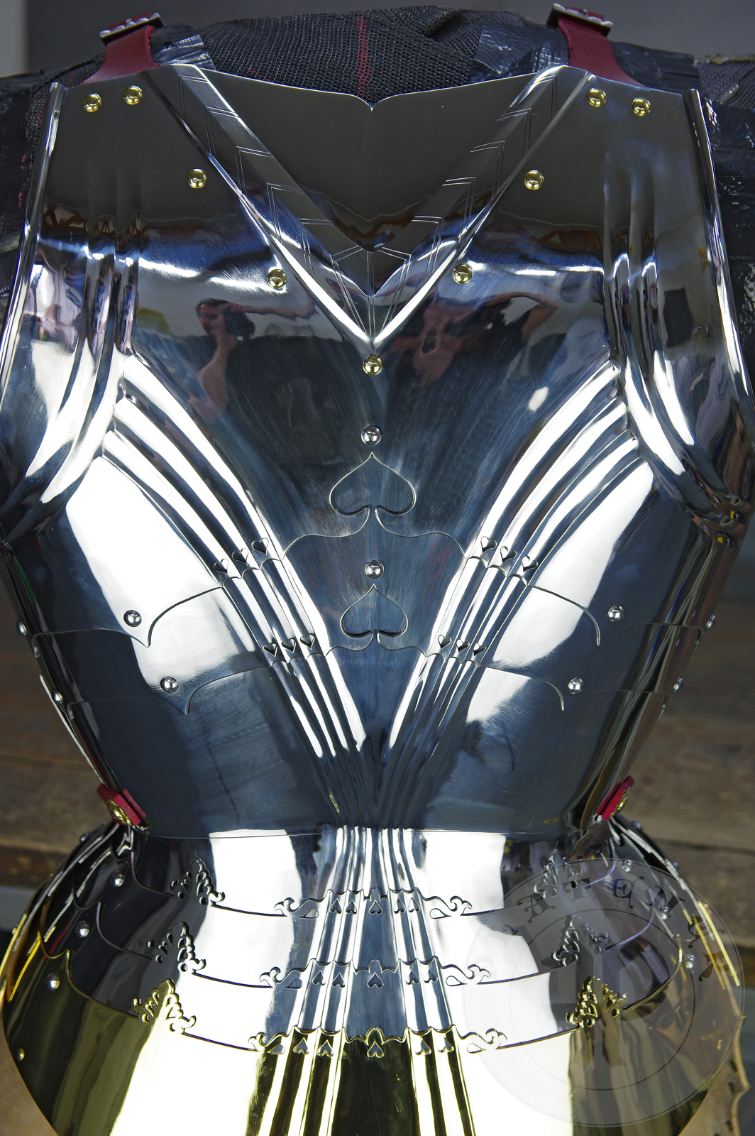 The high gothic set circa 1480-1485 in Helmschmied style consists of sallet, bevor and cuirass. They are made of steel in various thickness: 2 mm; 1,5 mm and 1,2 mm and heat hardened and tempered up to 42 HRC for cuirass with bevor and 38 HRC for sallet. The visor, lower lames and tassets are brass gilded. I also crafted handmade steel buckles for this set. Overall it involved around 850 of work hours to make it.