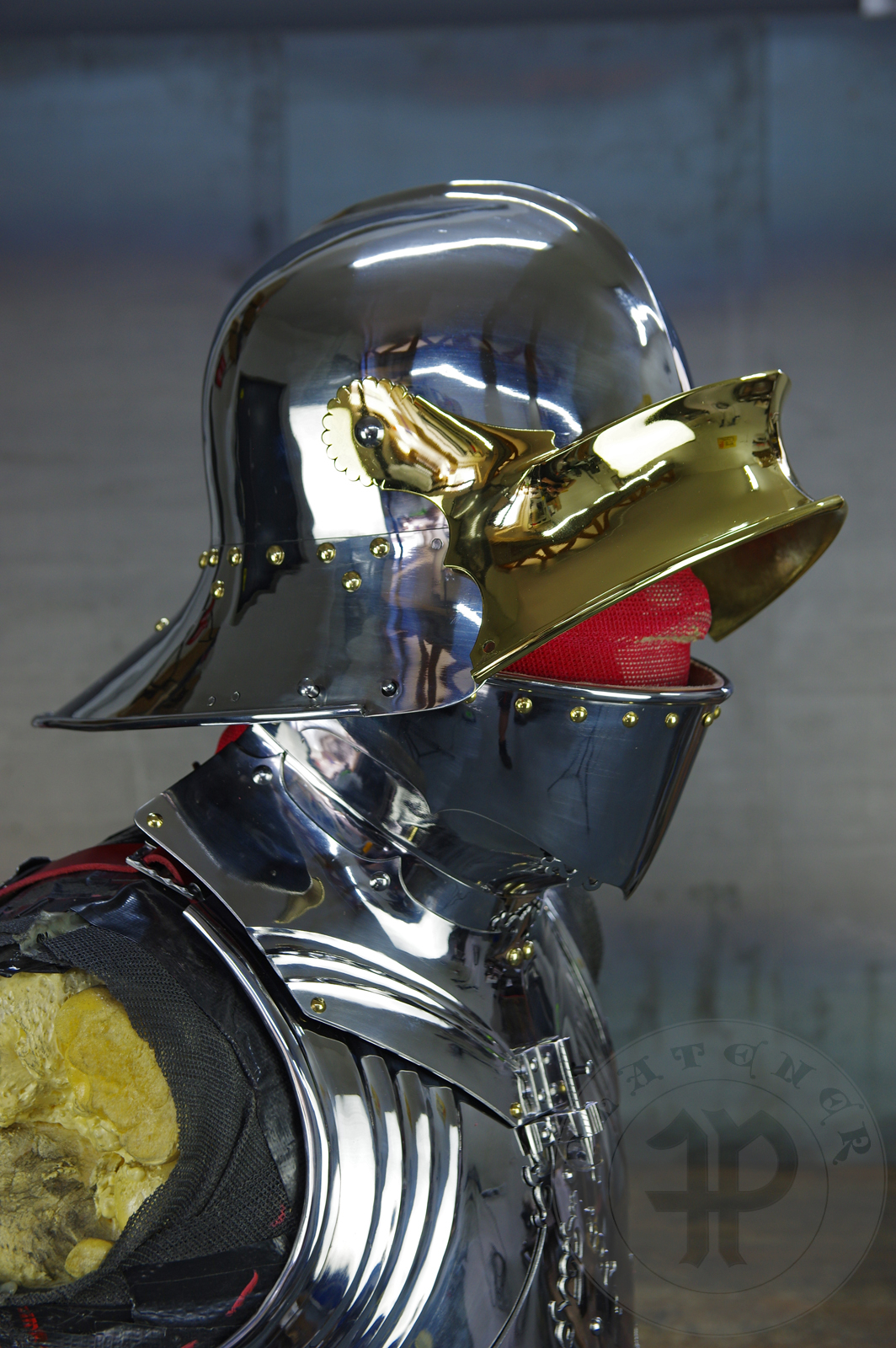 The high gothic set circa 1480-1485 in Helmschmied style consists of sallet, bevor and cuirass. They are made of steel in various thickness: 2 mm; 1,5 mm and 1,2 mm and heat hardened and tempered up to 42 HRC for cuirass with bevor and 38 HRC for sallet. The visor, lower lames and tassets are brass gilded. I also crafted handmade steel buckles for this set. Overall it involved around 850 of work hours to make it.