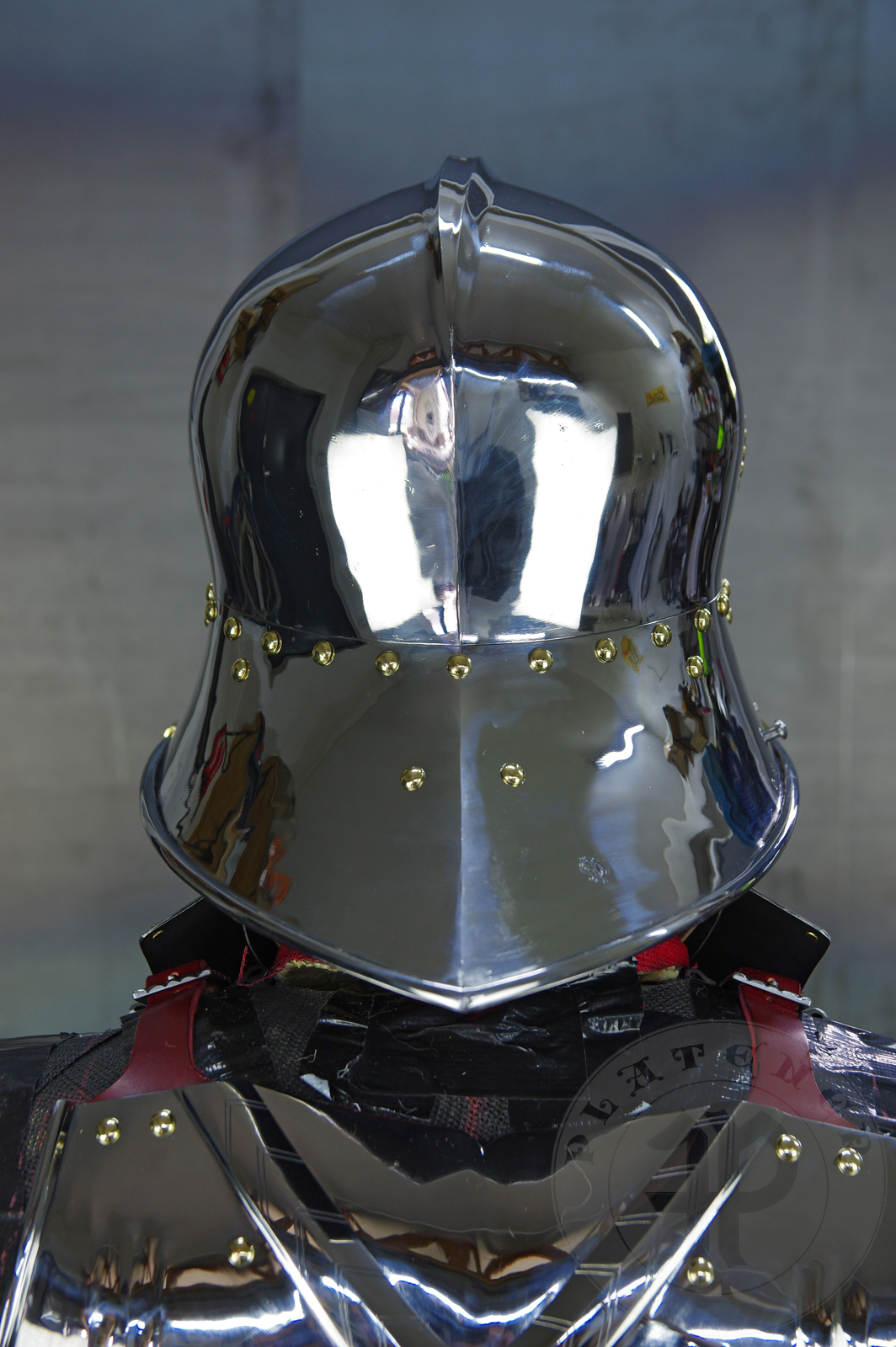 The high gothic set circa 1480-1485 in Helmschmied style consists of sallet, bevor and cuirass. They are made of steel in various thickness: 2 mm; 1,5 mm and 1,2 mm and heat hardened and tempered up to 42 HRC for cuirass with bevor and 38 HRC for sallet. The visor, lower lames and tassets are brass gilded. I also crafted handmade steel buckles for this set. Overall it involved around 850 of work hours to make it.