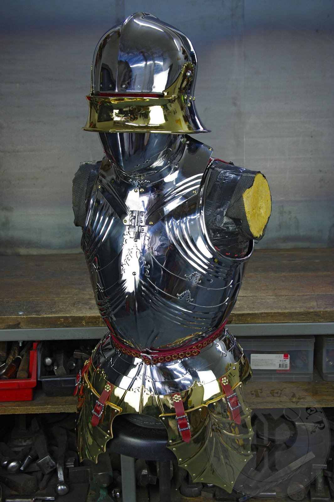 The high gothic set circa 1480-1485 in Helmschmied style consists of sallet, bevor and cuirass. They are made of steel in various thickness: 2 mm; 1,5 mm and 1,2 mm and heat hardened and tempered up to 42 HRC for cuirass with bevor and 38 HRC for sallet. The visor, lower lames and tassets are brass gilded. I also crafted handmade steel buckles for this set. Overall it involved around 850 of work hours to make it.