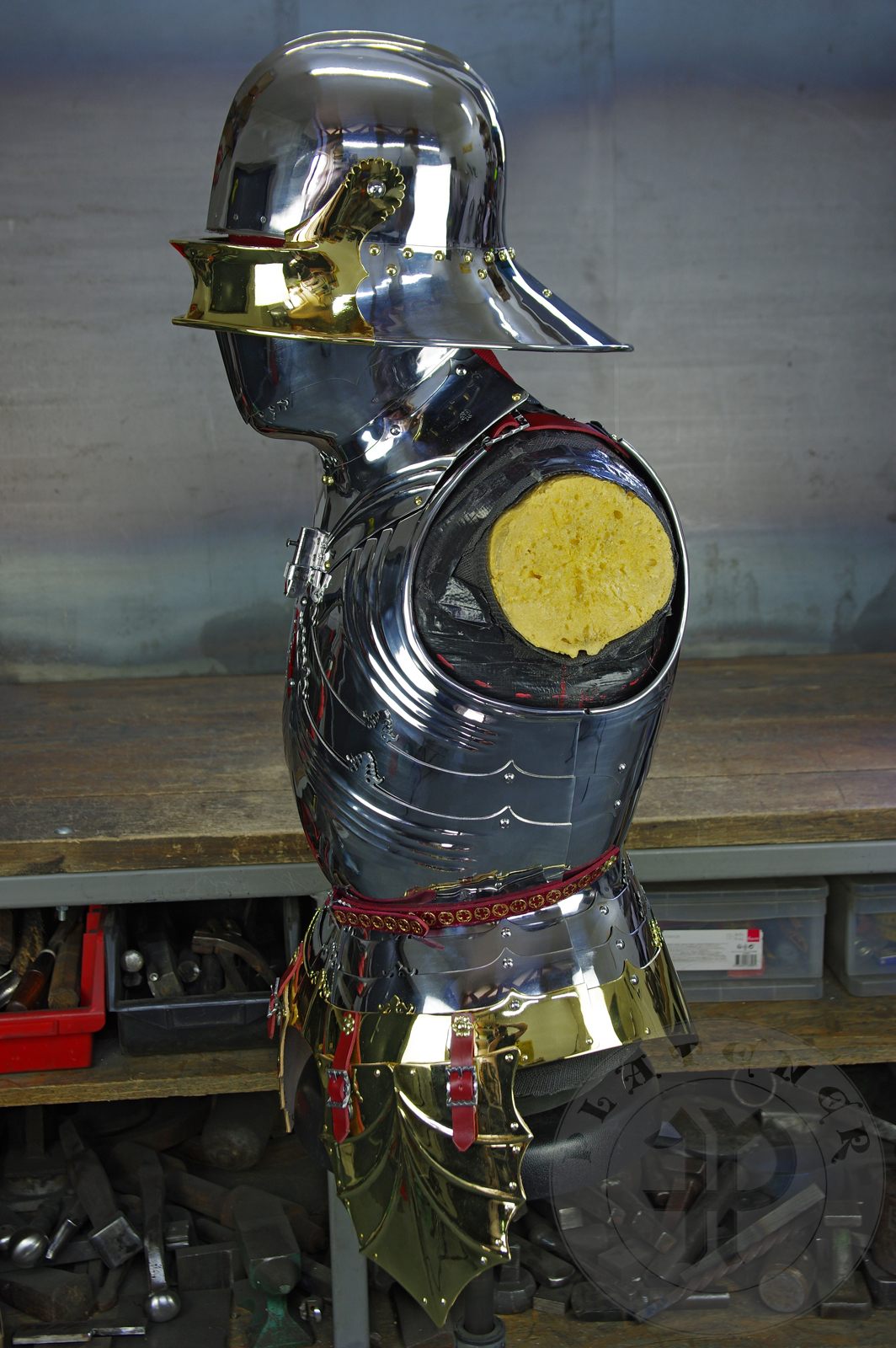 The high gothic set circa 1480-1485 in Helmschmied style consists of sallet, bevor and cuirass. They are made of steel in various thickness: 2 mm; 1,5 mm and 1,2 mm and heat hardened and tempered up to 42 HRC for cuirass with bevor and 38 HRC for sallet. The visor, lower lames and tassets are brass gilded. I also crafted handmade steel buckles for this set. Overall it involved around 850 of work hours to make it.