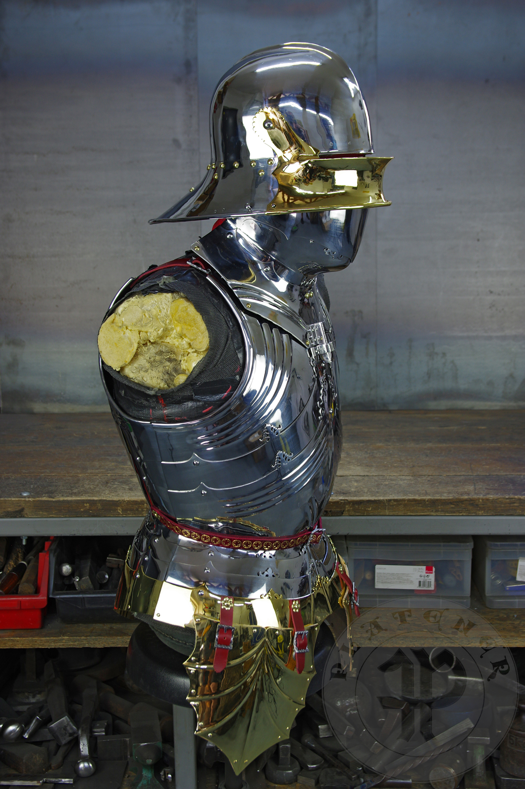 The high gothic set circa 1480-1485 in Helmschmied style consists of sallet, bevor and cuirass. They are made of steel in various thickness: 2 mm; 1,5 mm and 1,2 mm and heat hardened and tempered up to 42 HRC for cuirass with bevor and 38 HRC for sallet. The visor, lower lames and tassets are brass gilded. I also crafted handmade steel buckles for this set. Overall it involved around 850 of work hours to make it.