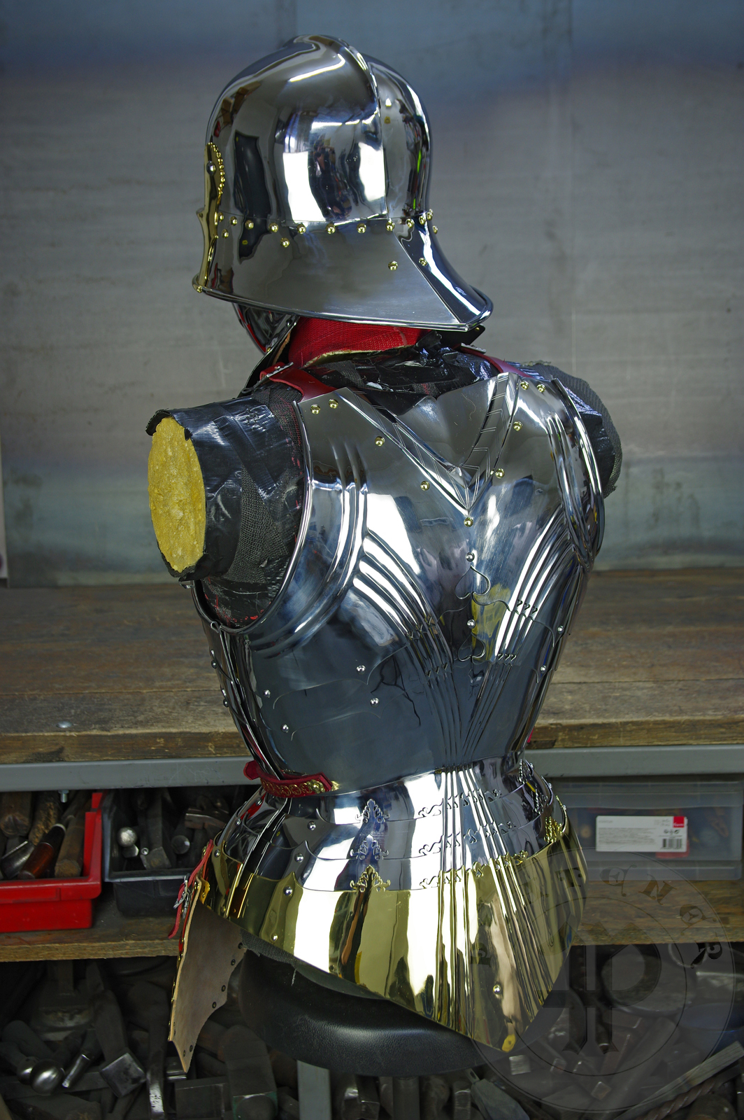 The high gothic set circa 1480-1485 in Helmschmied style consists of sallet, bevor and cuirass. They are made of steel in various thickness: 2 mm; 1,5 mm and 1,2 mm and heat hardened and tempered up to 42 HRC for cuirass with bevor and 38 HRC for sallet. The visor, lower lames and tassets are brass gilded. I also crafted handmade steel buckles for this set. Overall it involved around 850 of work hours to make it.